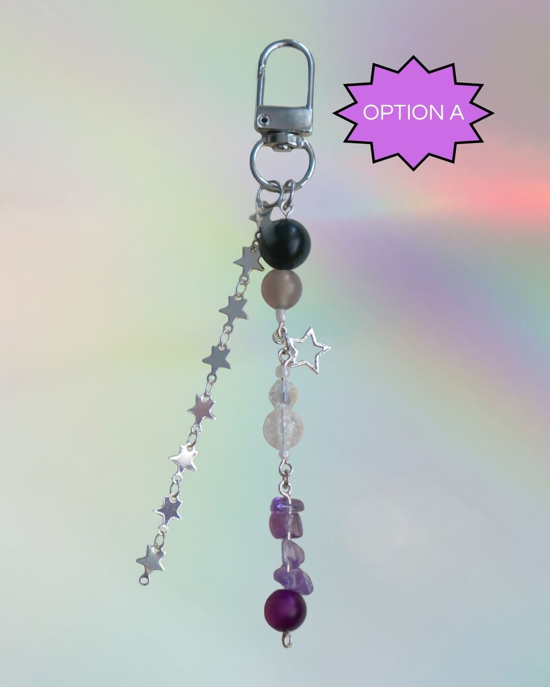 Ace flag themed keychain with purple, black, grey, and clear beads 
