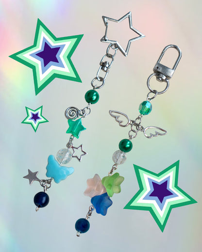 Gay flag themed keychain with green and blue beads and a silver clasp