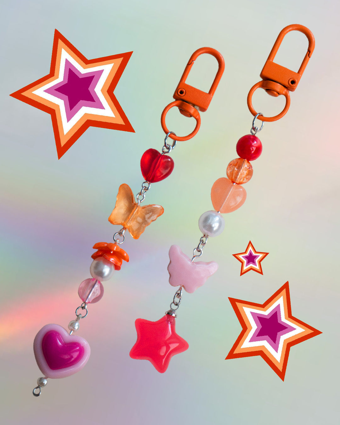 Colorful keychain with star, heart, and butterfly charms in the colors of the Lesbian flag